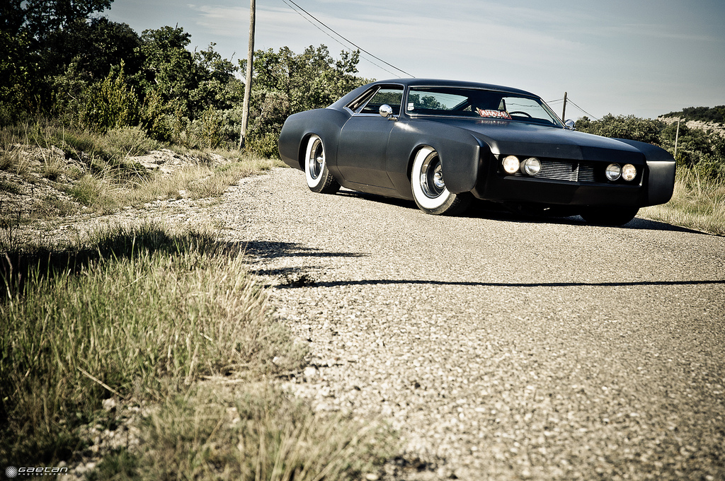 Here's a photo shoot of a fully customized 1966 Buick Riviera Grand Sport