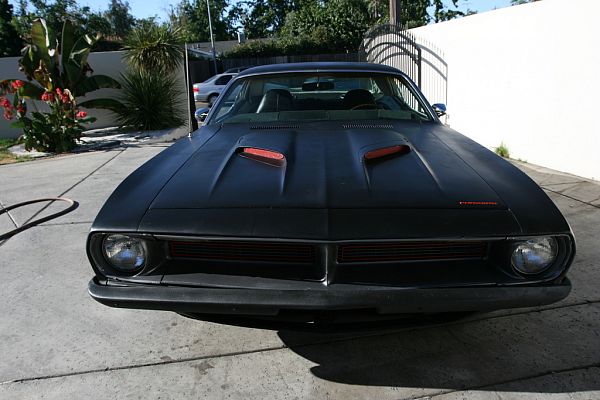 Quite beautiful custom Barracuda in matte black with black stripes and a bit